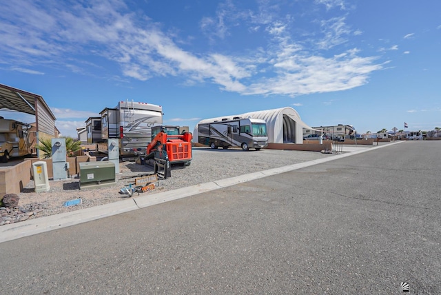 exterior space featuring a carport