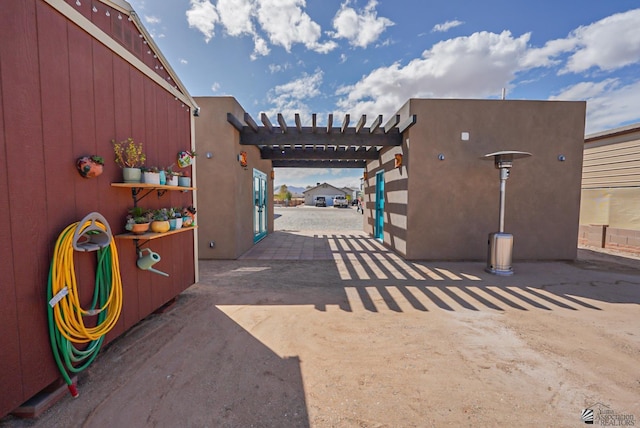 surrounding community featuring a patio and a pergola