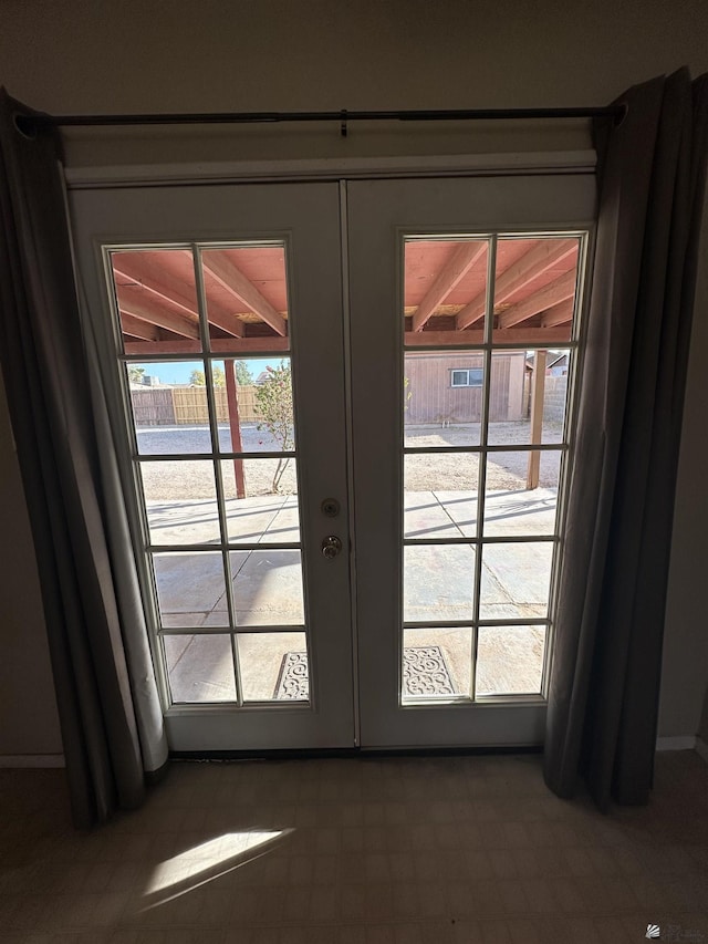 doorway featuring a wealth of natural light and french doors