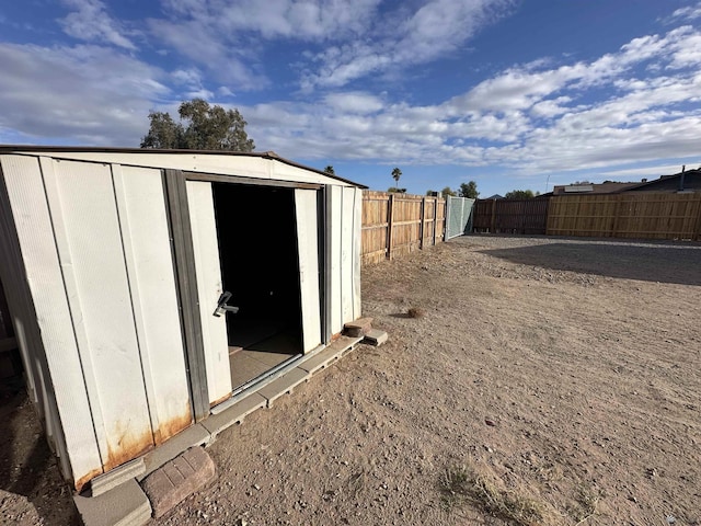 view of shed featuring a fenced backyard