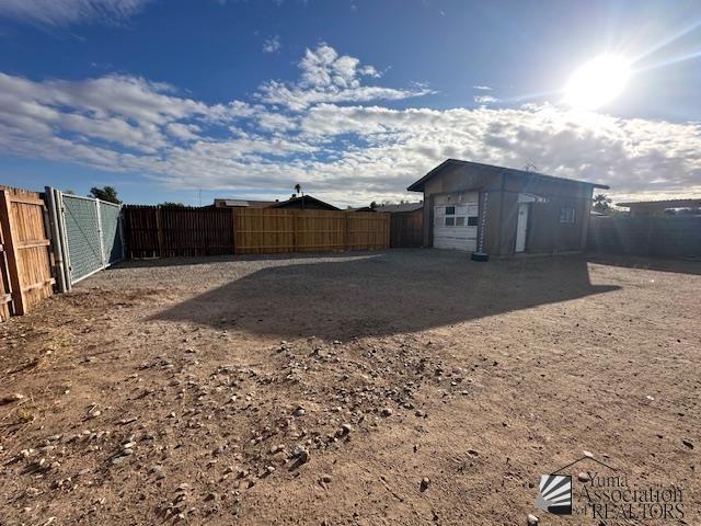 view of yard with fence