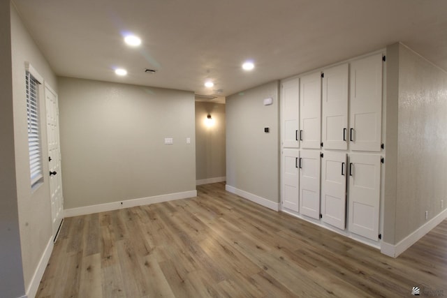 unfurnished bedroom with light hardwood / wood-style flooring