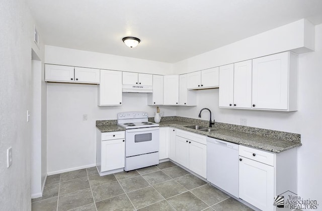 kitchen featuring white appliances, white cabinetry, and a sink