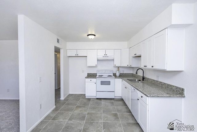 kitchen featuring white appliances, white cabinetry, a sink, and under cabinet range hood