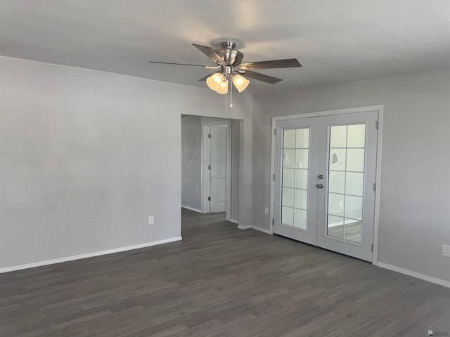 unfurnished room featuring french doors, baseboards, dark wood finished floors, and a ceiling fan