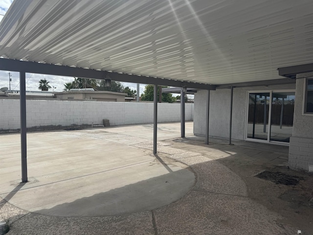 view of patio / terrace featuring fence