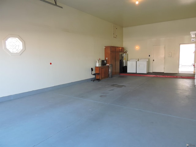 garage featuring washer and dryer