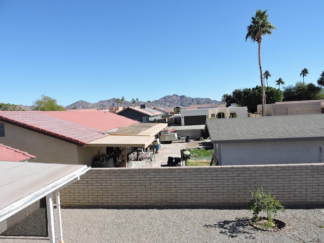 view of property exterior featuring a mountain view