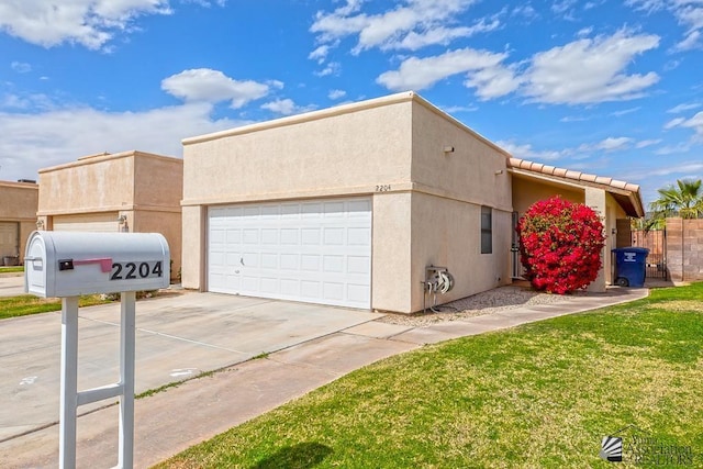 view of front facade featuring concrete driveway, an attached garage, a front lawn, and stucco siding