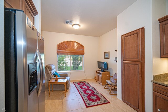 interior space featuring light tile patterned floors