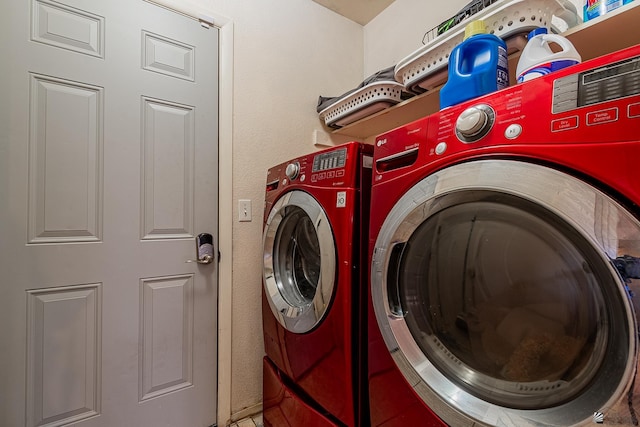 clothes washing area featuring laundry area and independent washer and dryer