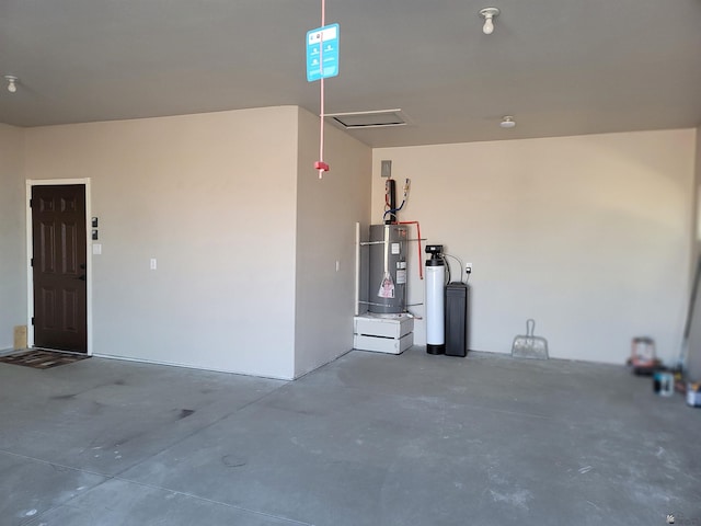 garage featuring water heater