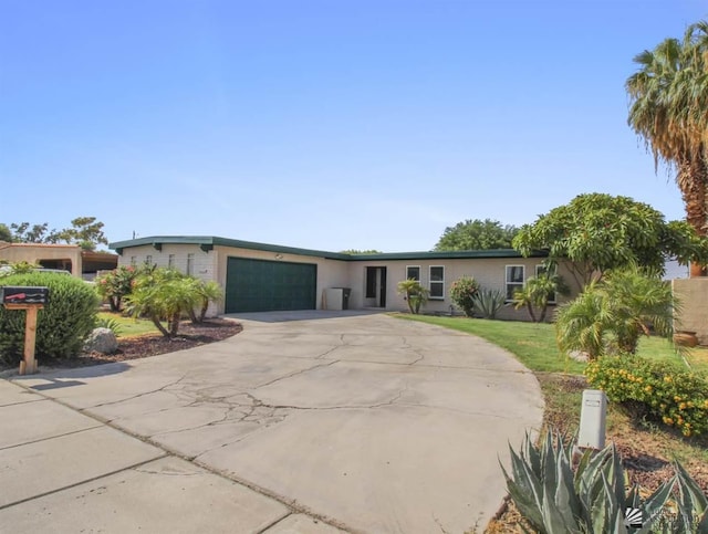 single story home featuring a garage