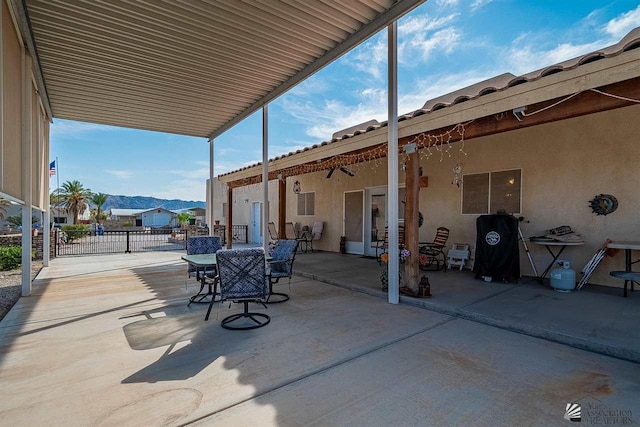 view of patio / terrace with a mountain view