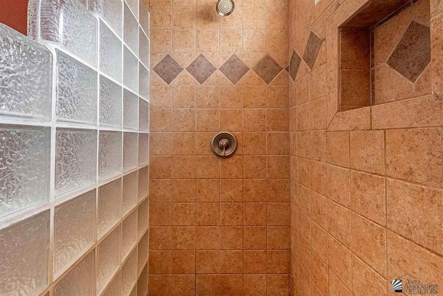 details with a tile shower