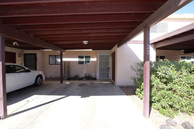 view of patio featuring a carport