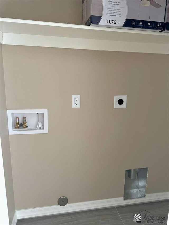 washroom featuring hookup for a washing machine and electric dryer hookup