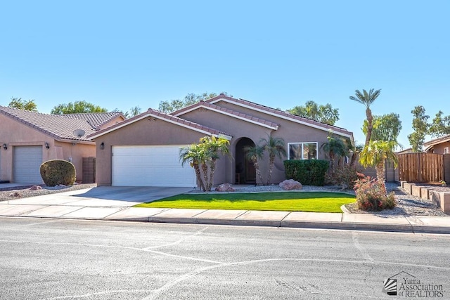 ranch-style home with a garage