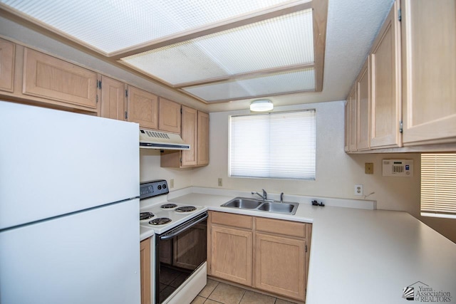 kitchen with electric range oven, sink, white refrigerator, light tile patterned floors, and light brown cabinets