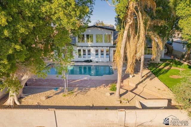 view of front of home featuring a patio area