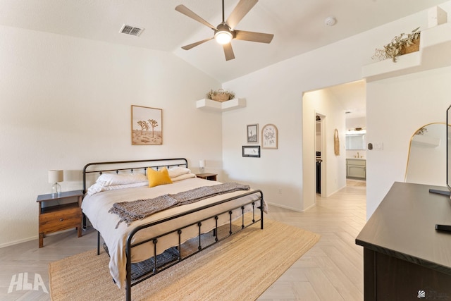 bedroom featuring light parquet floors, vaulted ceiling, and ceiling fan