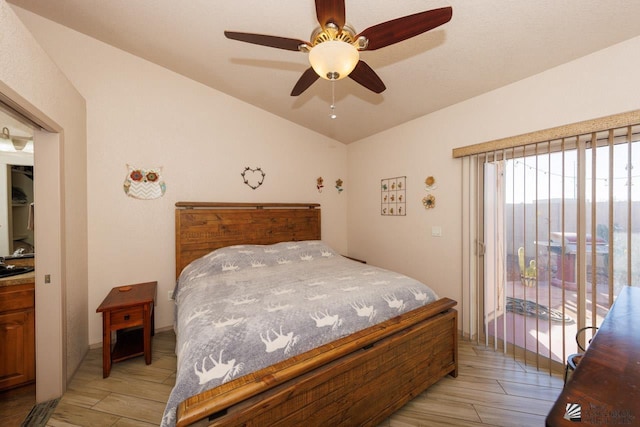 bedroom featuring ceiling fan, vaulted ceiling, and light wood-type flooring