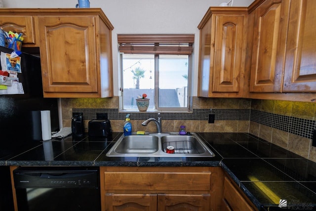 kitchen with black dishwasher, backsplash, and sink