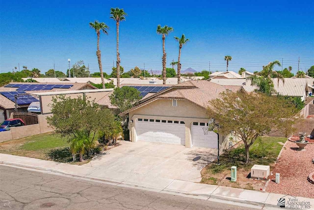 view of front of home with a garage