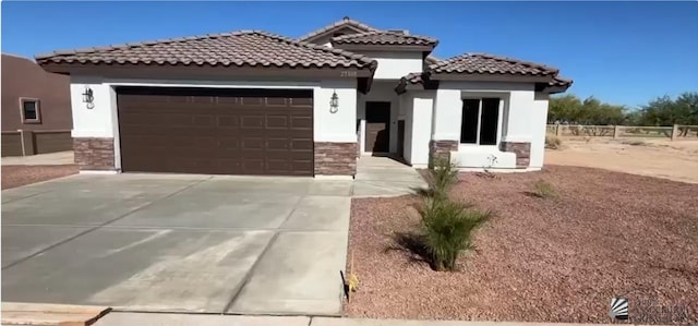 view of front of property featuring a garage