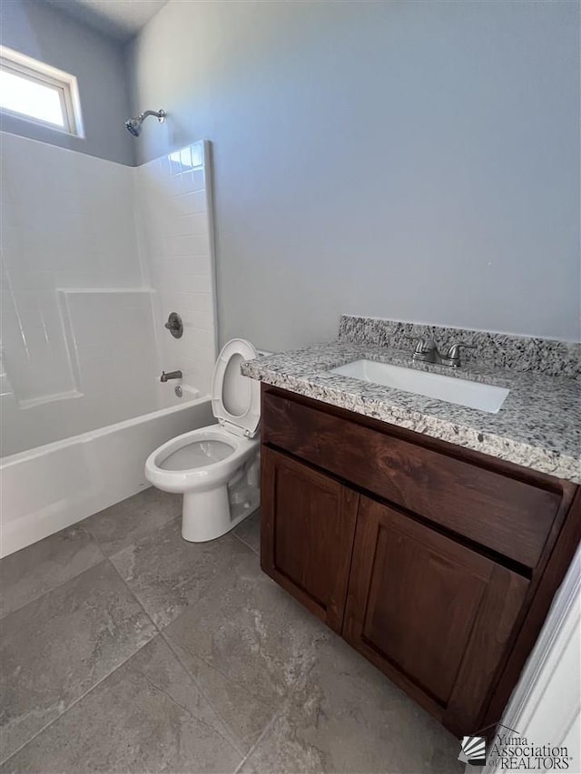 full bathroom featuring vanity, toilet, and  shower combination