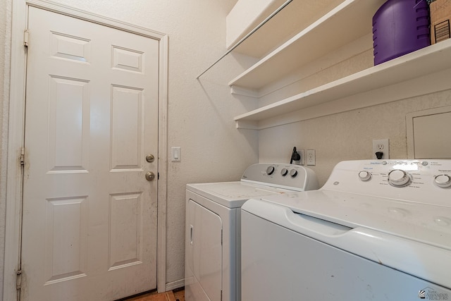 laundry area featuring washing machine and dryer