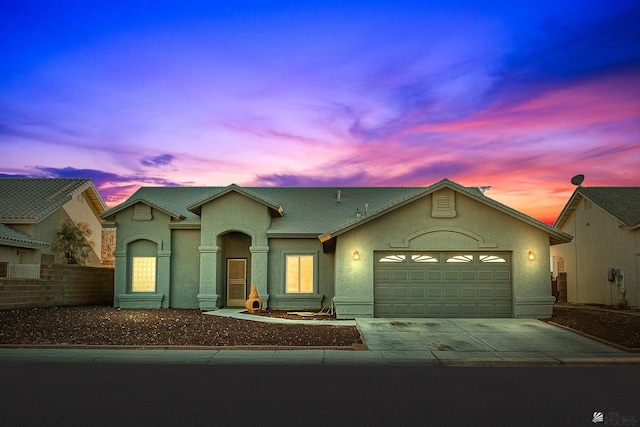 ranch-style home with a garage