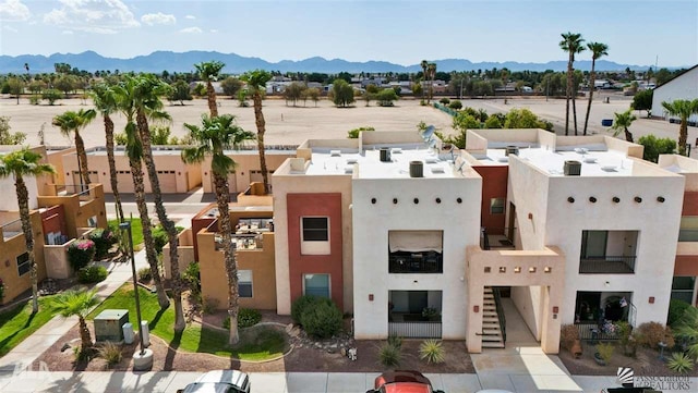 view of building exterior with a mountain view