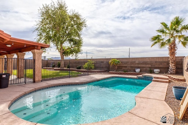 view of pool with a fenced in pool and a fenced backyard