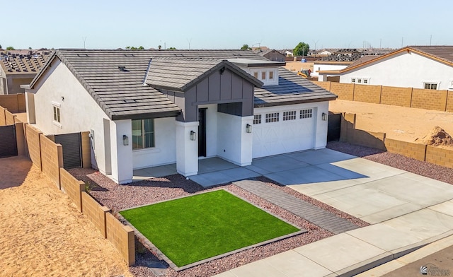 view of front of home with a garage