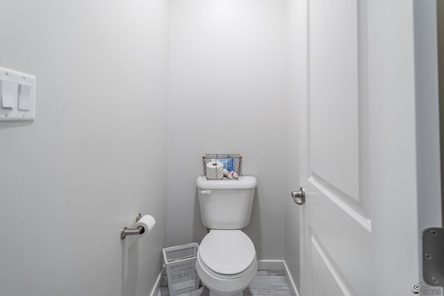 bathroom featuring toilet