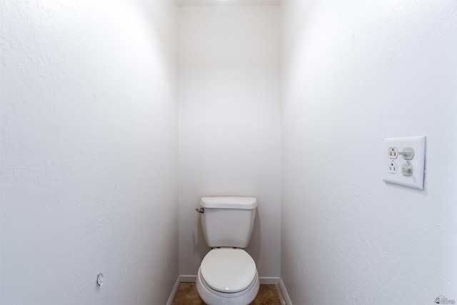 bathroom featuring toilet