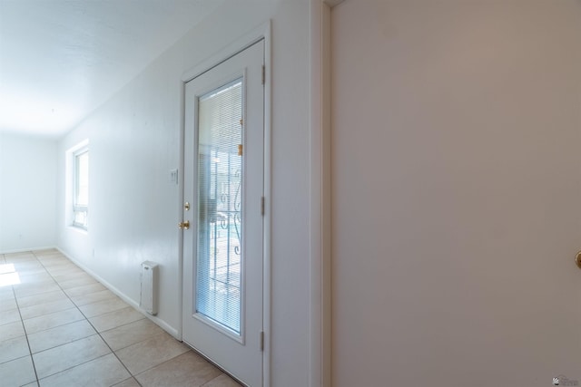 entryway featuring light tile patterned flooring