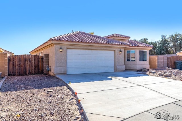 view of front of home with a garage