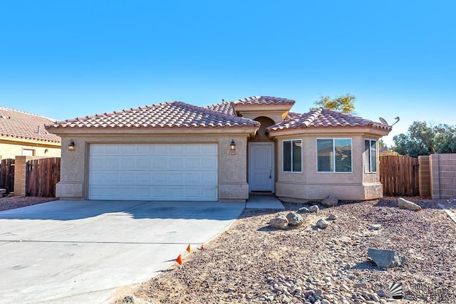 view of front of property with a garage