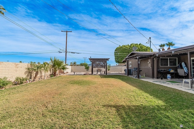 view of yard featuring a patio and a pergola