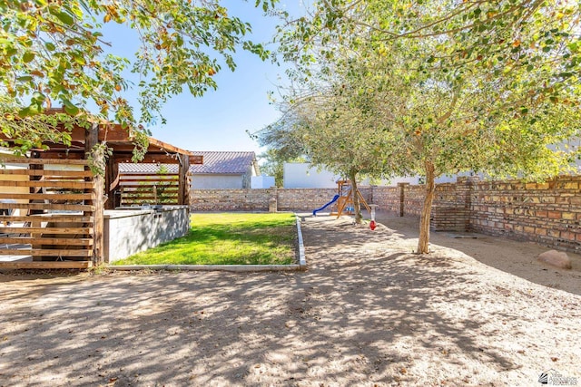 view of yard featuring a fenced backyard