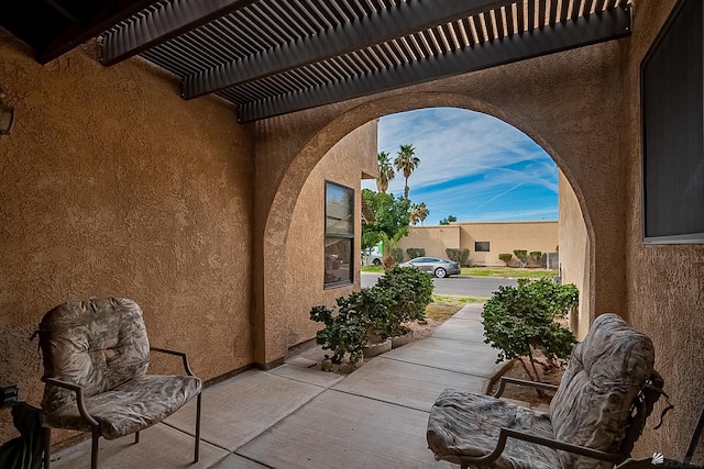 view of patio / terrace featuring a pergola