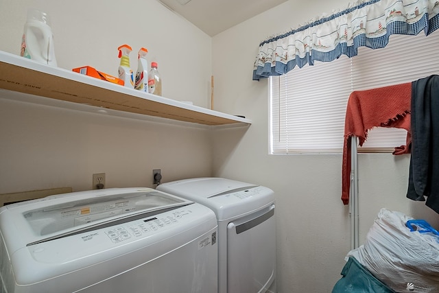 laundry area featuring laundry area and separate washer and dryer