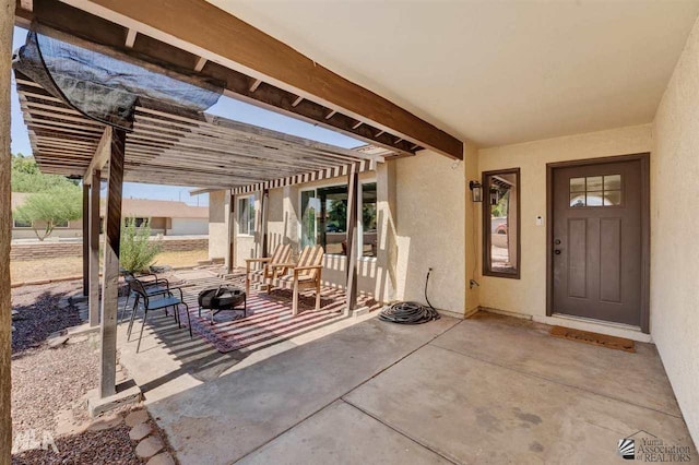 view of patio featuring a pergola