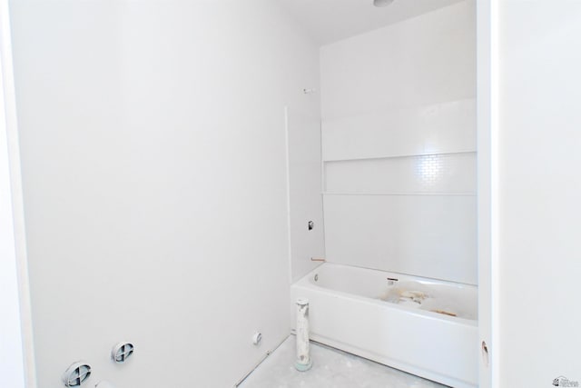 bathroom featuring concrete flooring