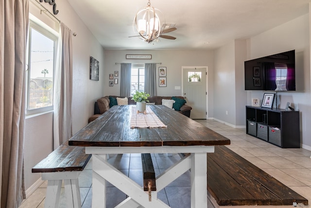 tiled dining space featuring breakfast area