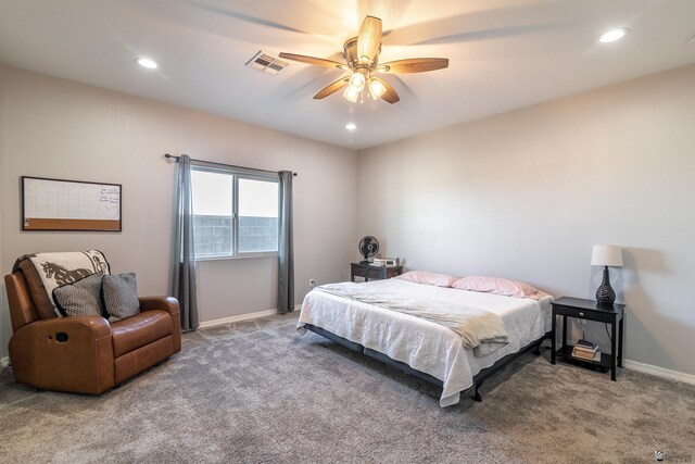 bedroom with light carpet and ceiling fan