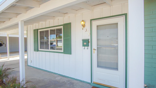 entrance to property with a porch