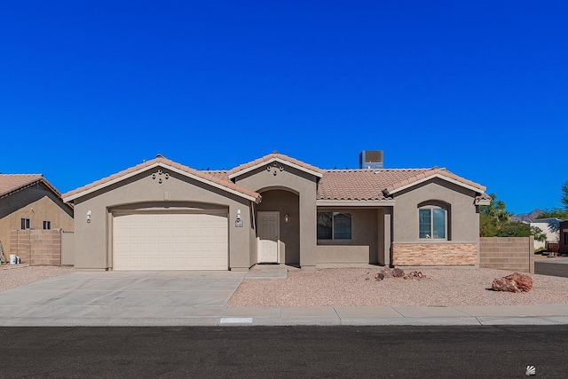 view of front of home with a garage